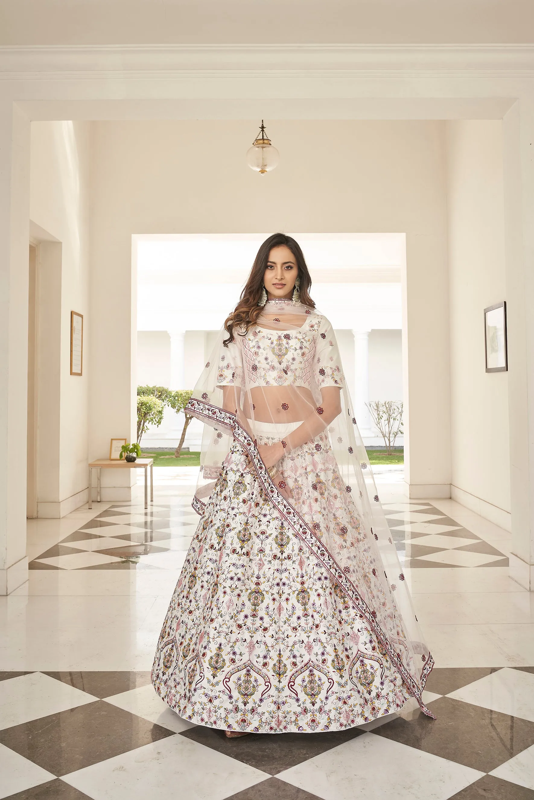 Fascinating White Embroidered Silk Party Wear Lehenga Choli