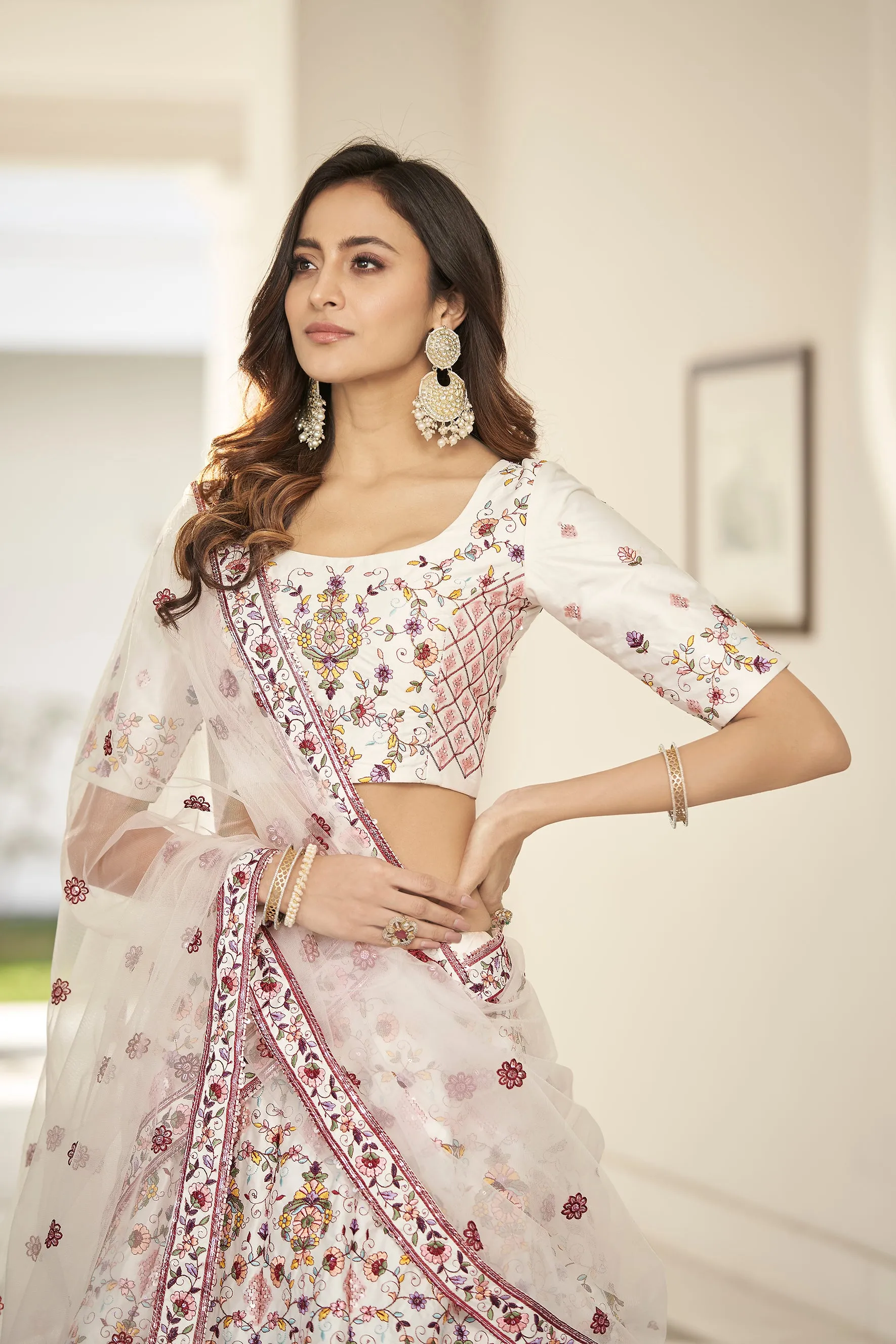 Fascinating White Embroidered Silk Party Wear Lehenga Choli